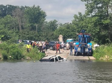 2025 06 30 LACRESCENT boat rrailer in rvr - Winona Journal