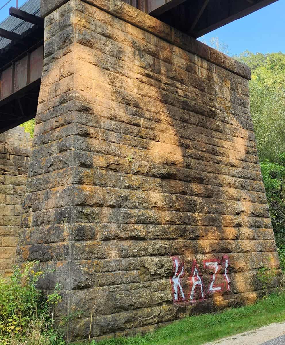 ARCHES bridge KAZI graffiti 2024-08-19 ARCHES bridge KAZI graffiti 2024 08 19 scaled - Winona Journal