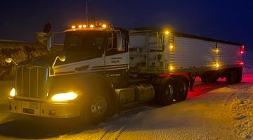 semi truck w ligts night semi truck w ligts night - Winona Journal